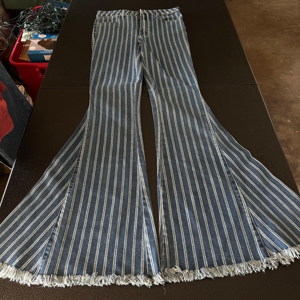 Free People Vertical Striped Flare Jeans with Frayed Hem
